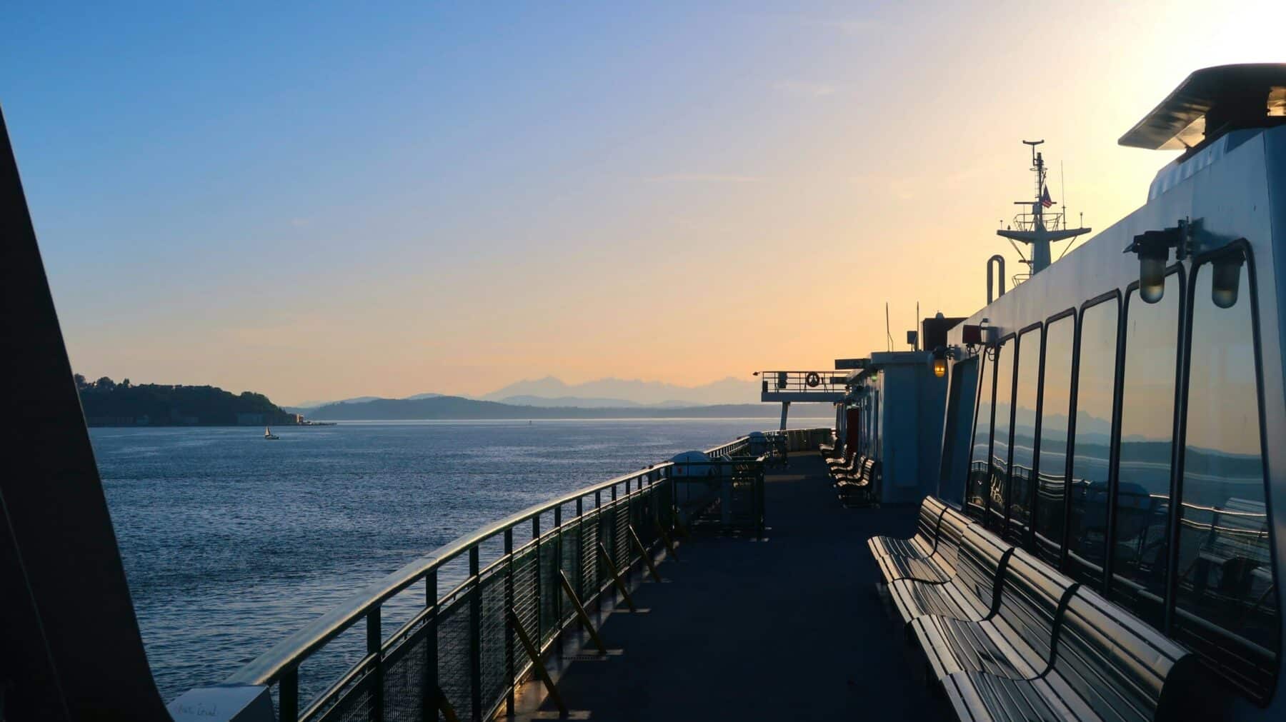 Ferry deck overlooking Puget Sound near Seattle cruise terminals at sunset