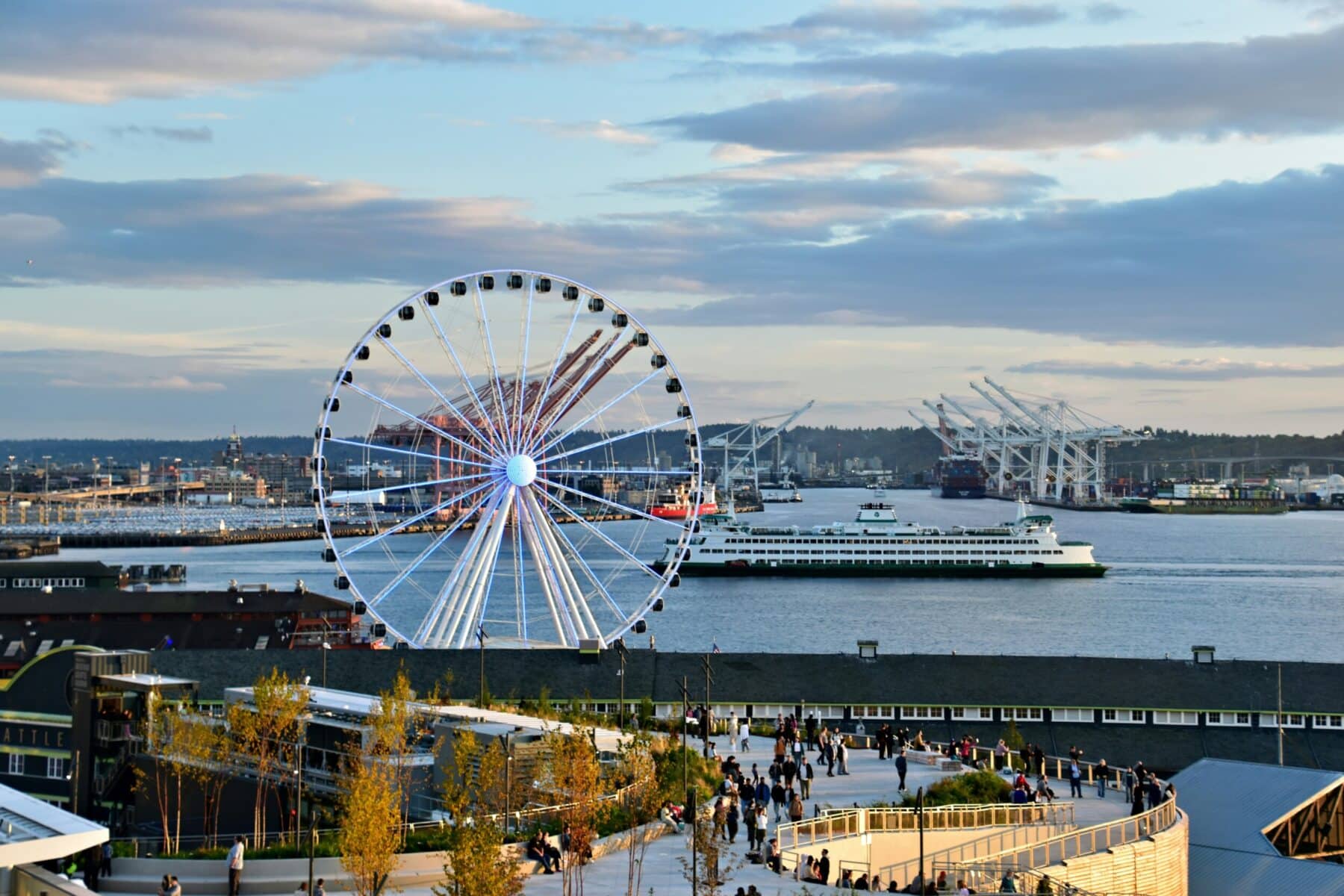 Seattle waterfront with the Seattle Great Wheel and ferry on Elliott Bay